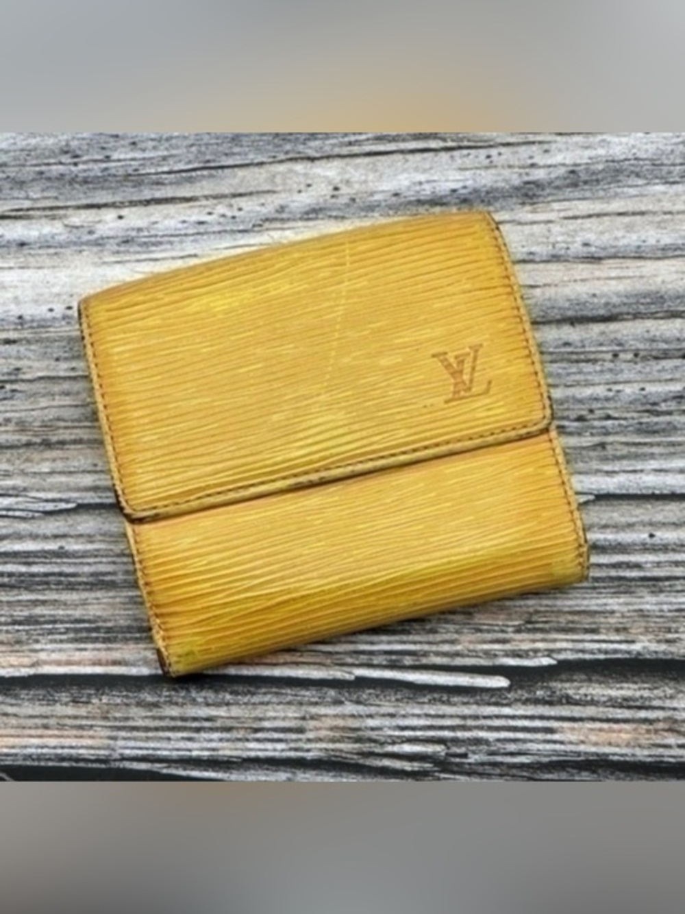 AUTHENTIC Louis Vuitton Marco Wallet. Preowned. Tassel yellow.
